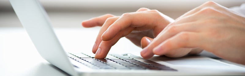 A laptop being used - Big Bend Chevrolet in Chiefland FL